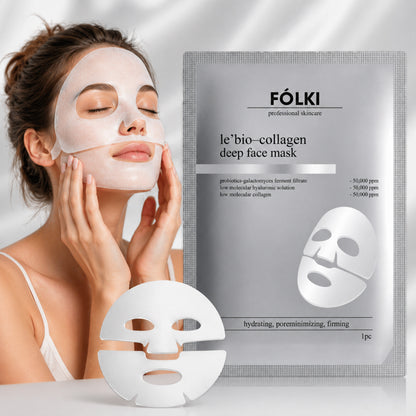 Woman wearing a Fölki le'bö-colagen deep face mask with packaging in the background.